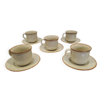 5 enameled stoneware cups and saucers