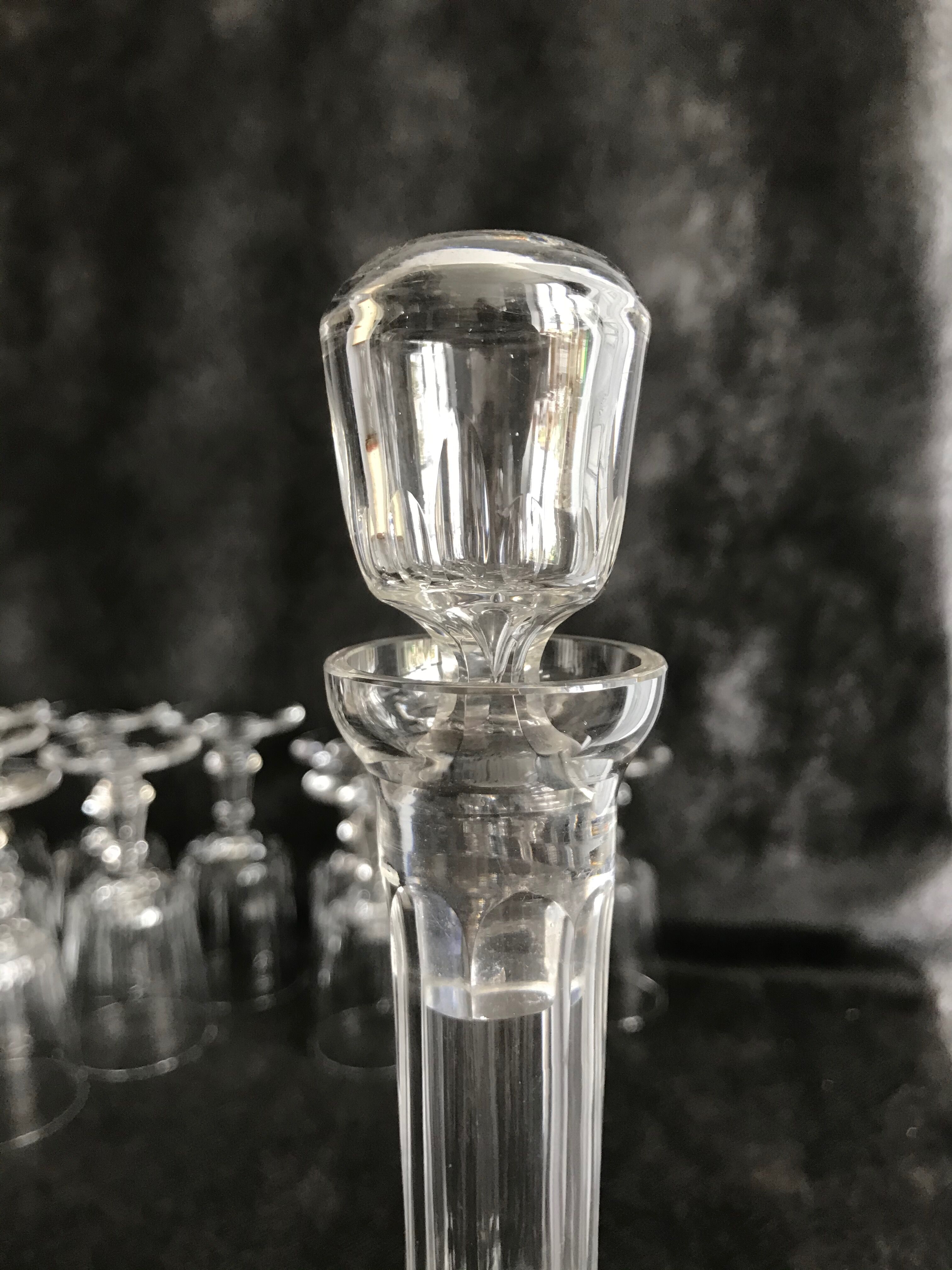 11 glasses and 1 wine carafe