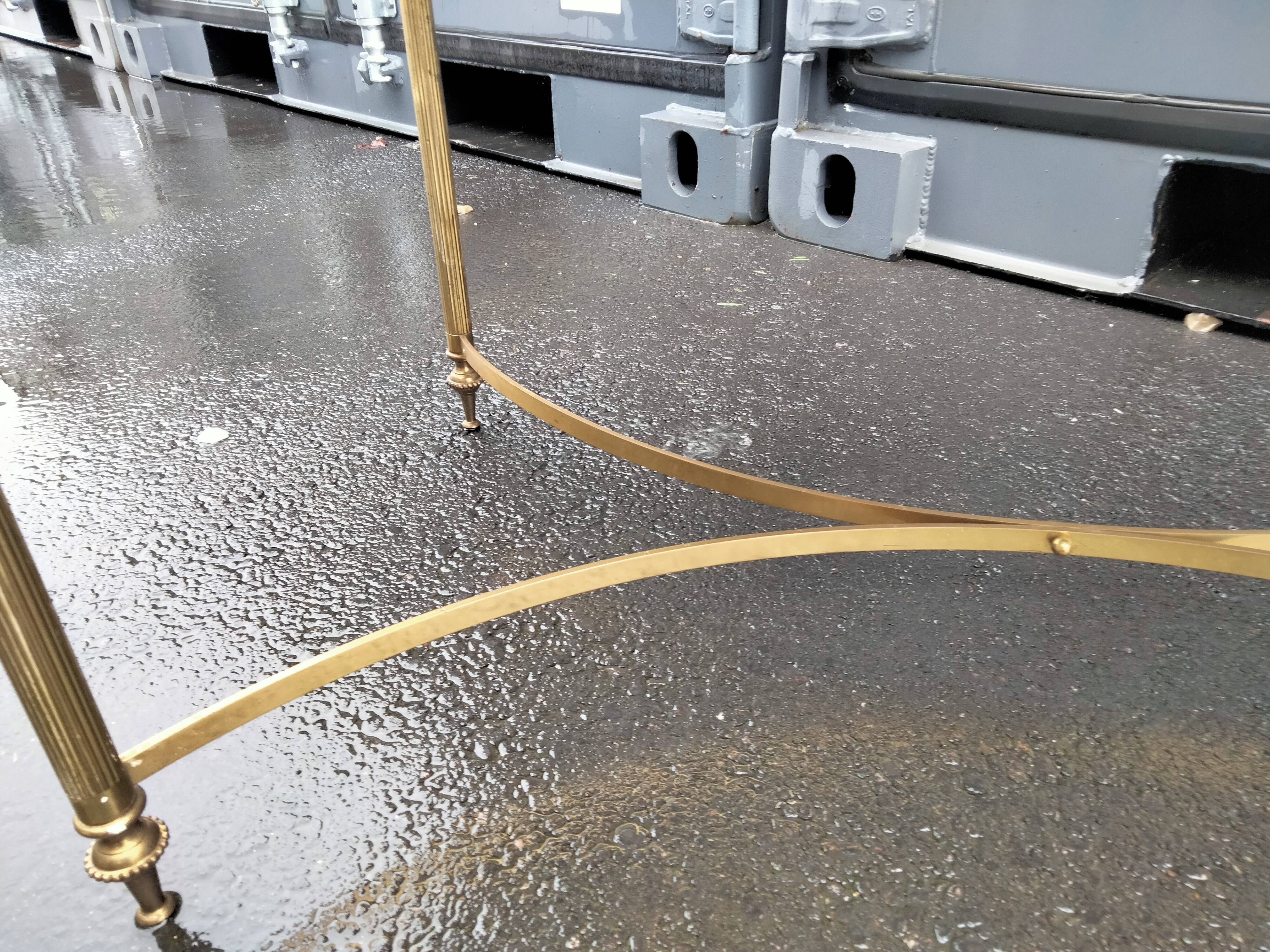 Old vintage gilded side table with marble top