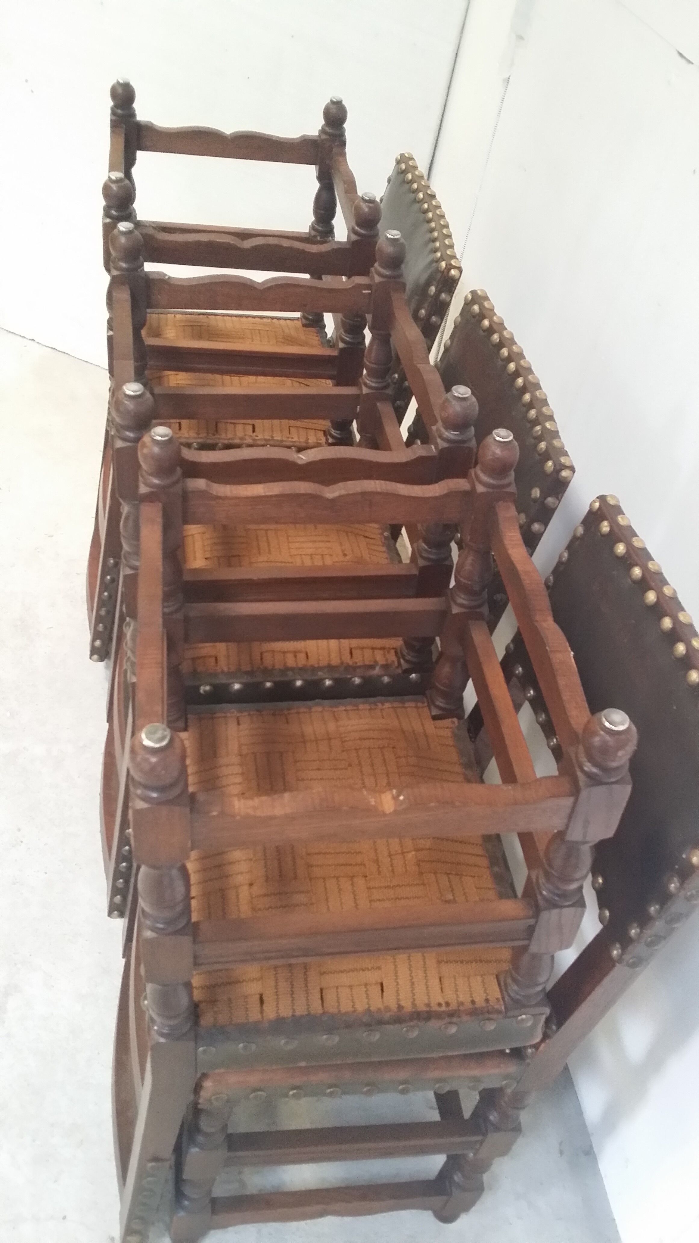 a set of six leather chairs and nails