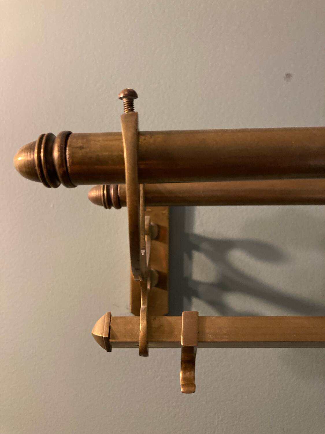 Antique brass coat rack and wall-mounted hat holder