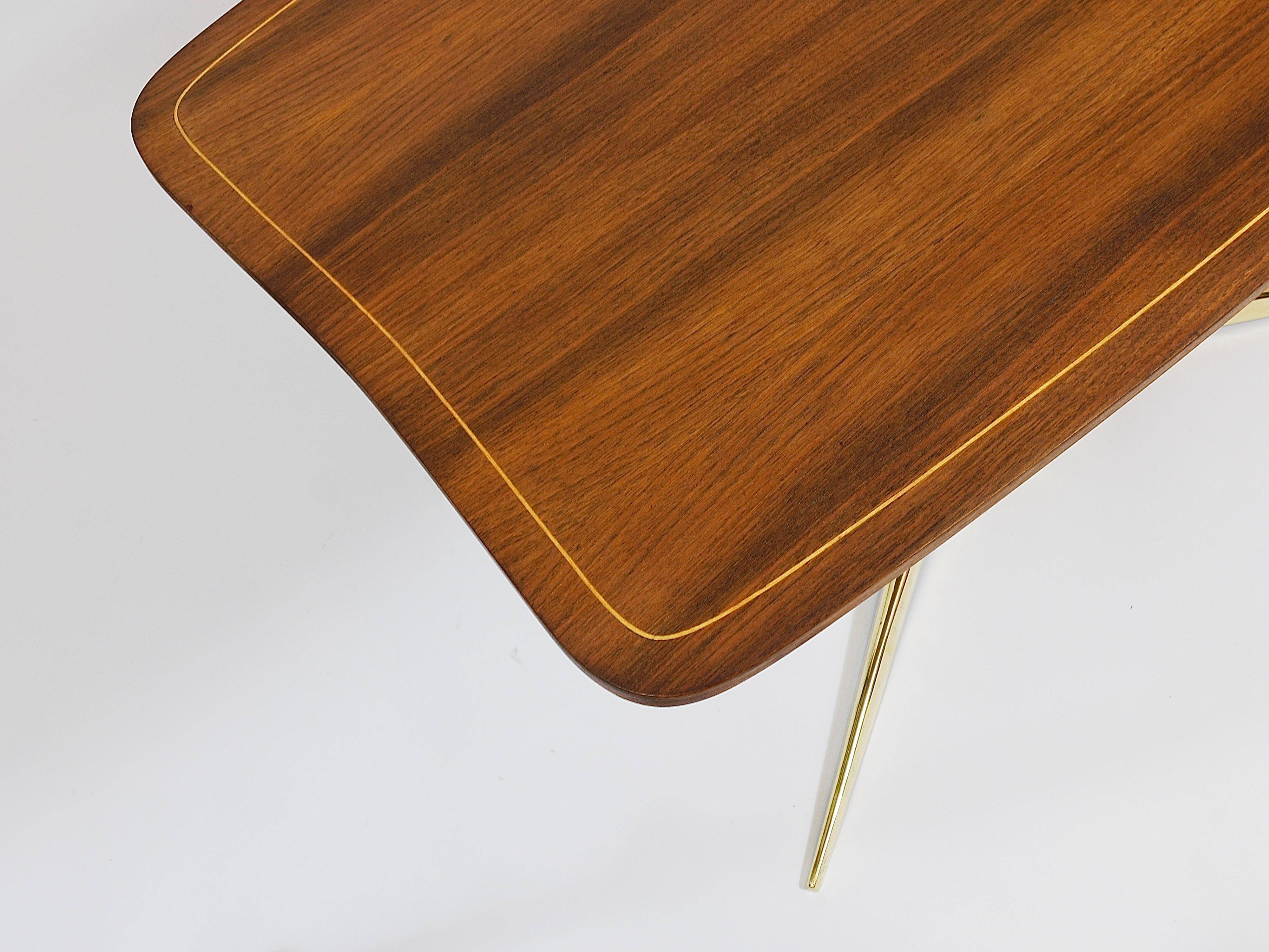 Oswald Haerdtl x Hagenauer Vienna coffee table in brass and walnut, Austria, 1950s