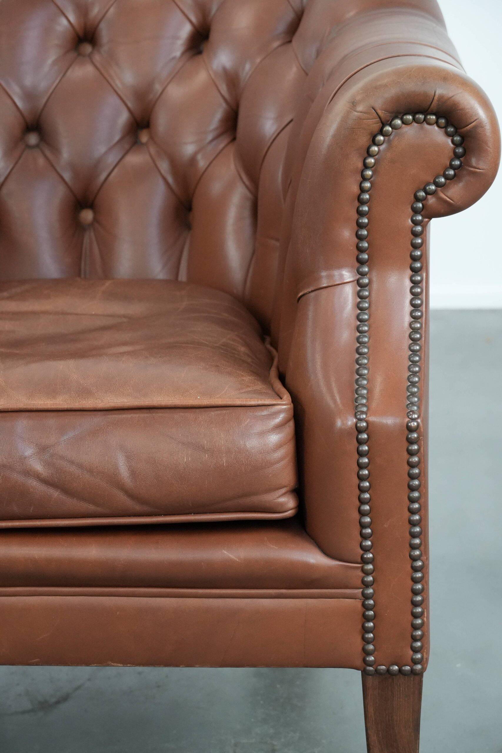 Chesterfield club armchair made of cowhide leather in English style