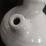 White ceramic goat-shaped creamer, first half of the 20th century.
