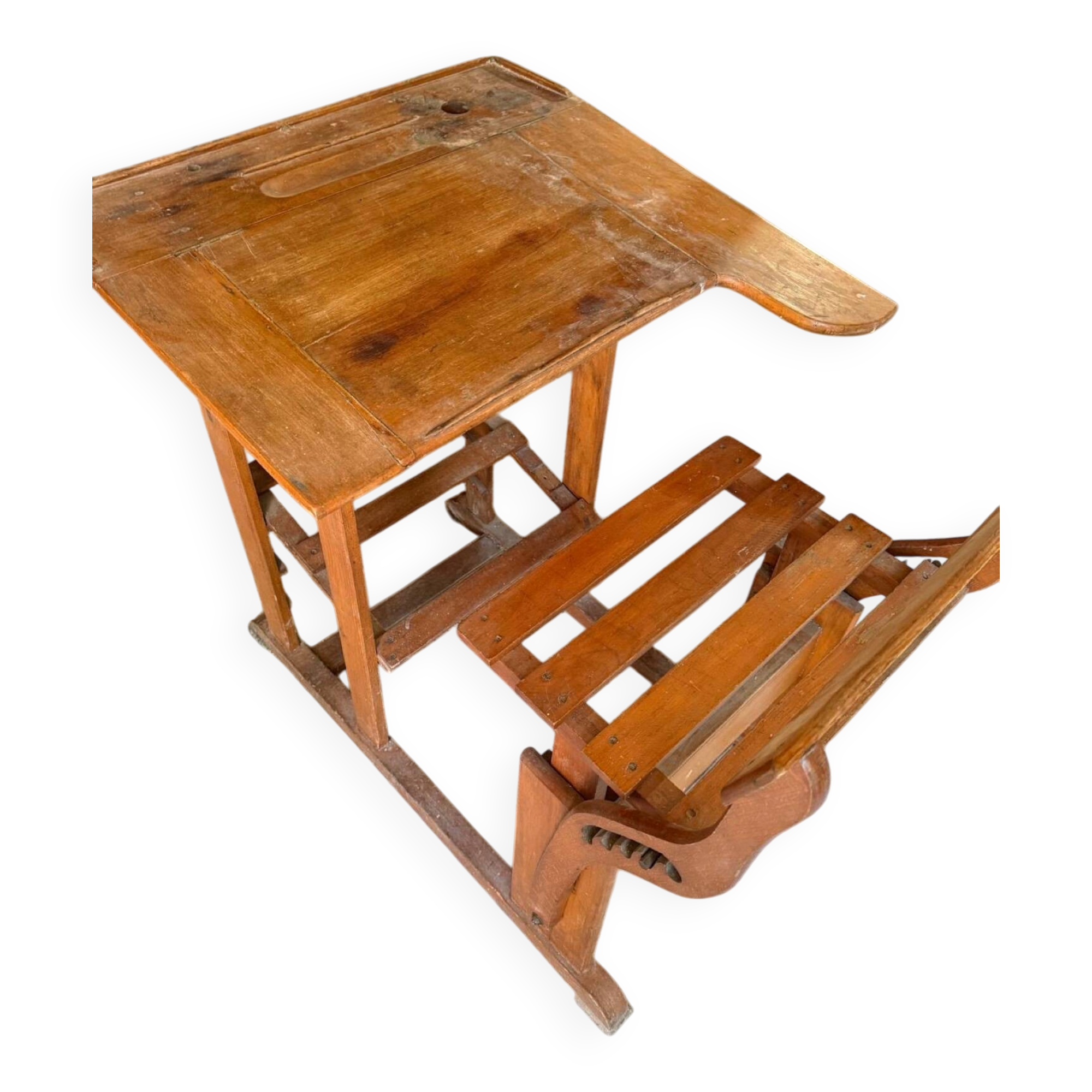 Old school desk with integrated adjustable seat.