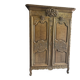 19th-century Norman wedding armoire, with bouquets of flowers and doves.