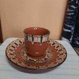 Set of etnic ceramic cups and plates