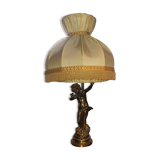 Brass cherub-laying lamp