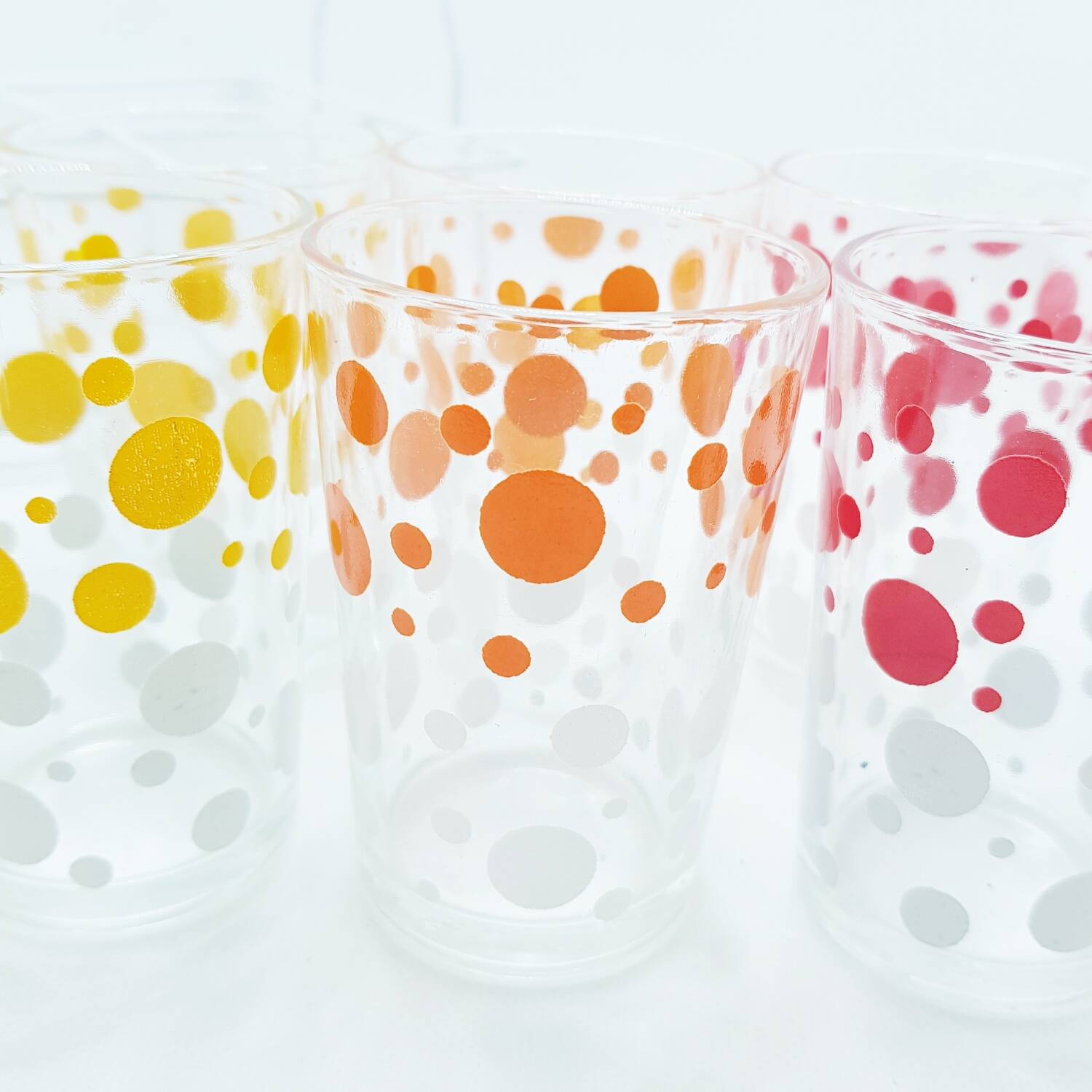6 polka dot juice glasses in carrier