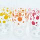 6 polka dot juice glasses in carrier