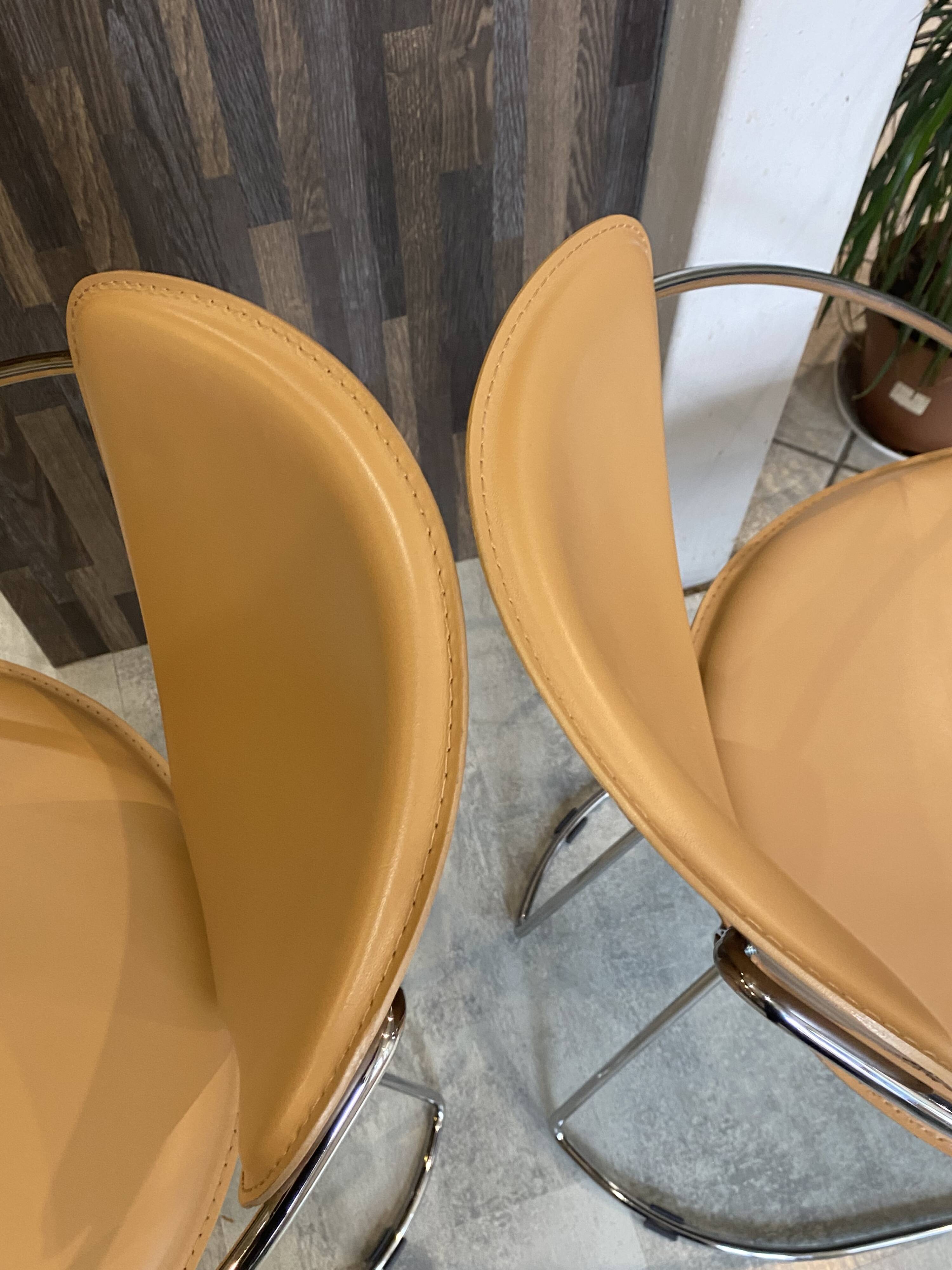 Set of 4 Linda armchairs by Arrben in camel leather with a chrome frame.