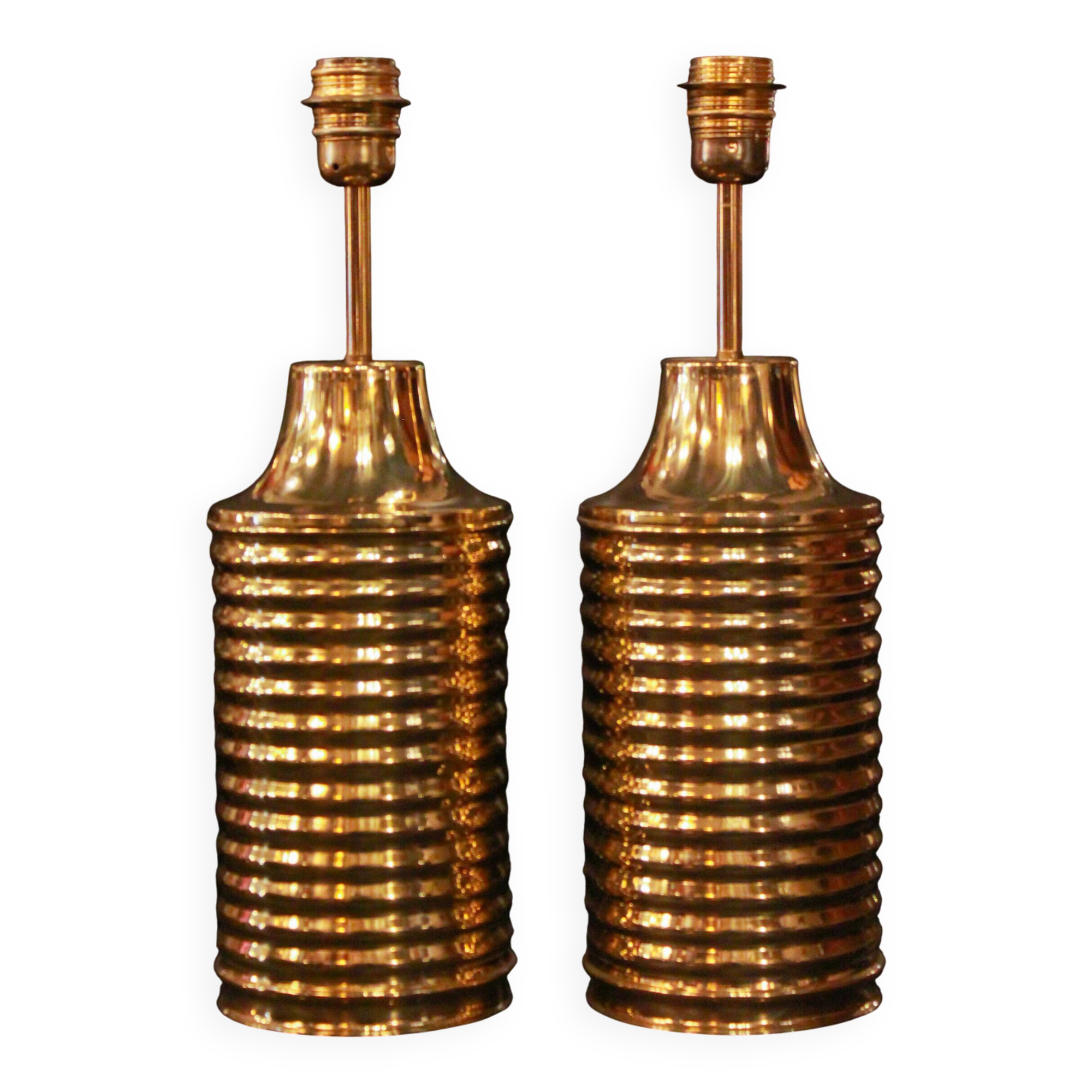 Pair of lamps in gilded brass