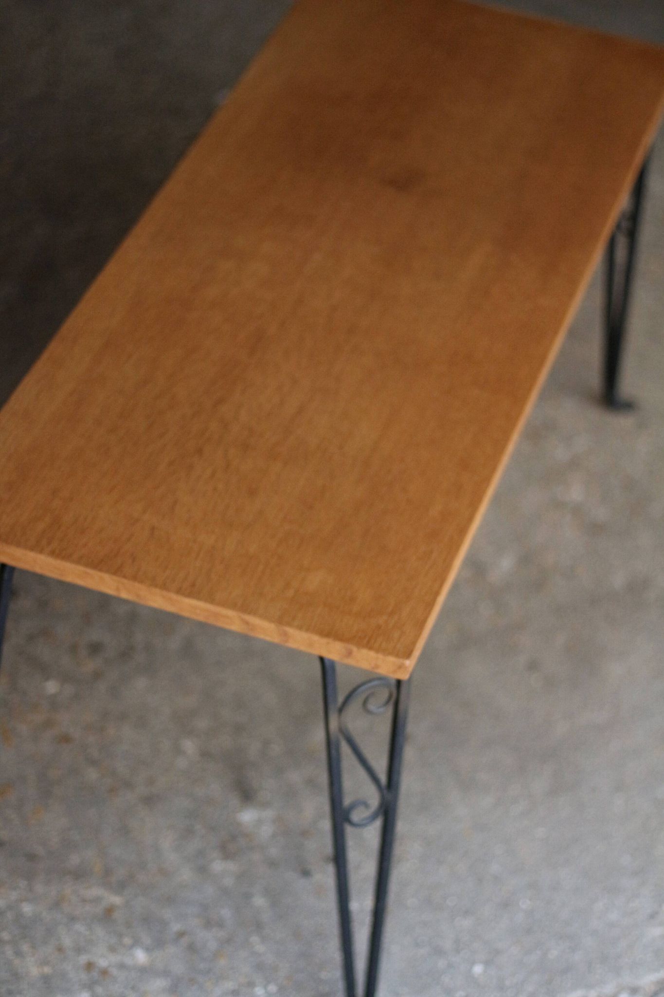 Nice vintage coffee table (1970s). Made of plywood and cast iron.