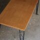 Beautiful vintage coffee table (1970s). Made of plywood and cast iron.