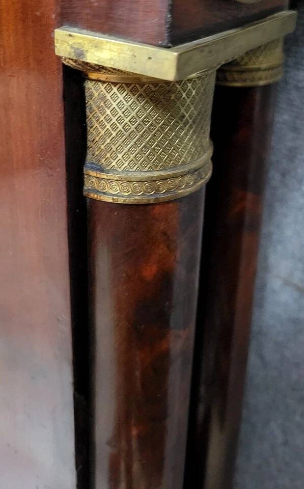 Rare Empire period mahogany bed with gilt bronze profiles circa 1800