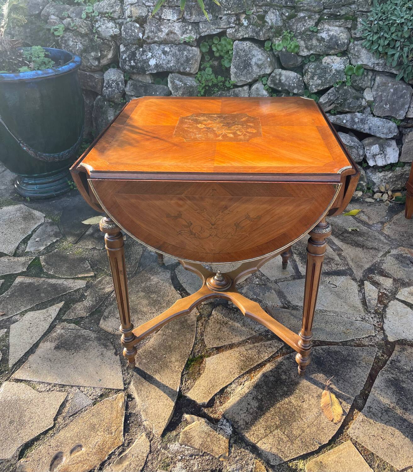 Center table decorated with marquetry of leaves and flowers in Louis XVI style, 19th century period