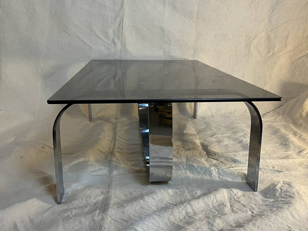 Vintage coffee table from the 70s in chrome and smoked glass, Space Age and Mid-Century style.