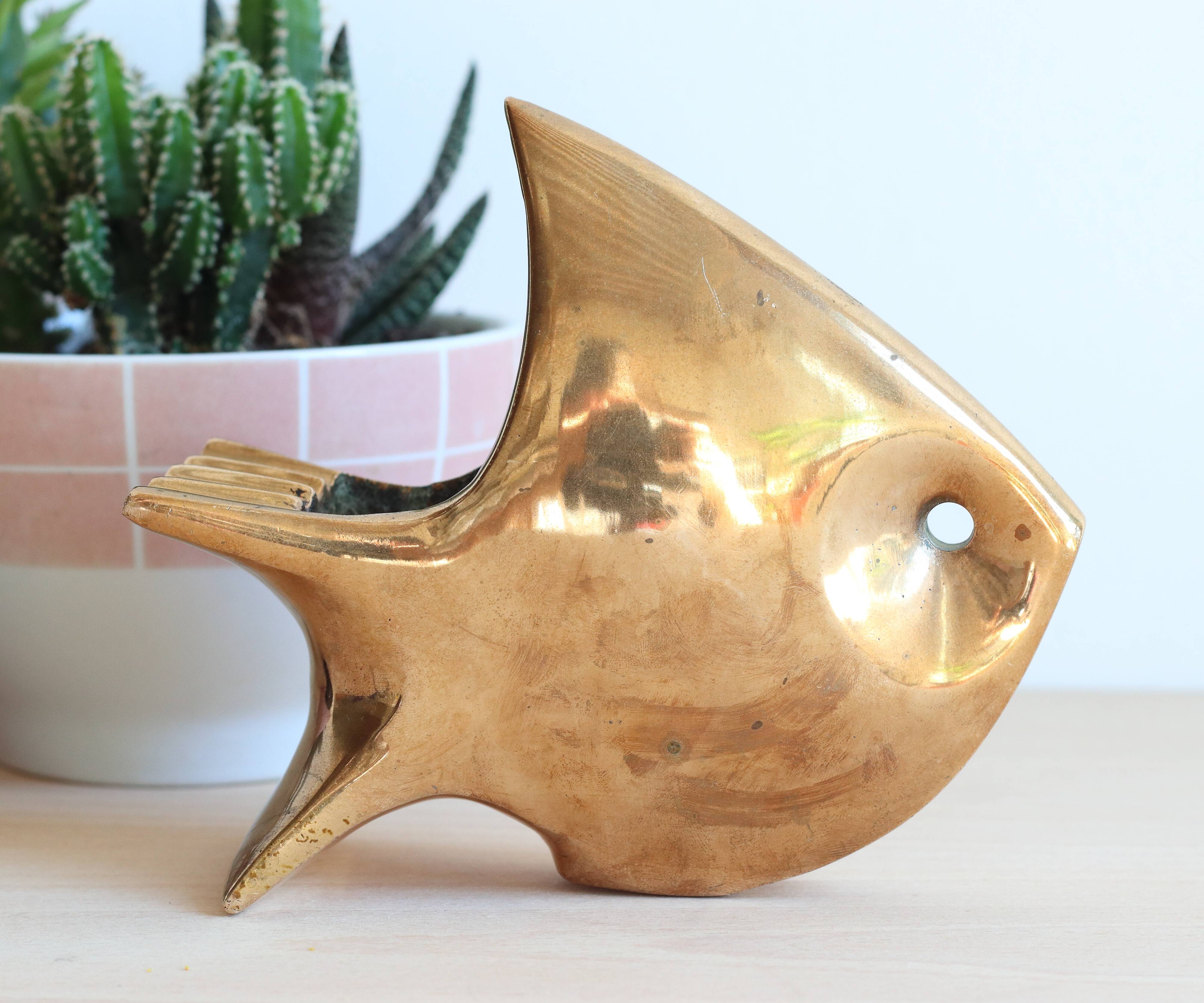 1960s solid brass ashtray in the shape of a stylized fish