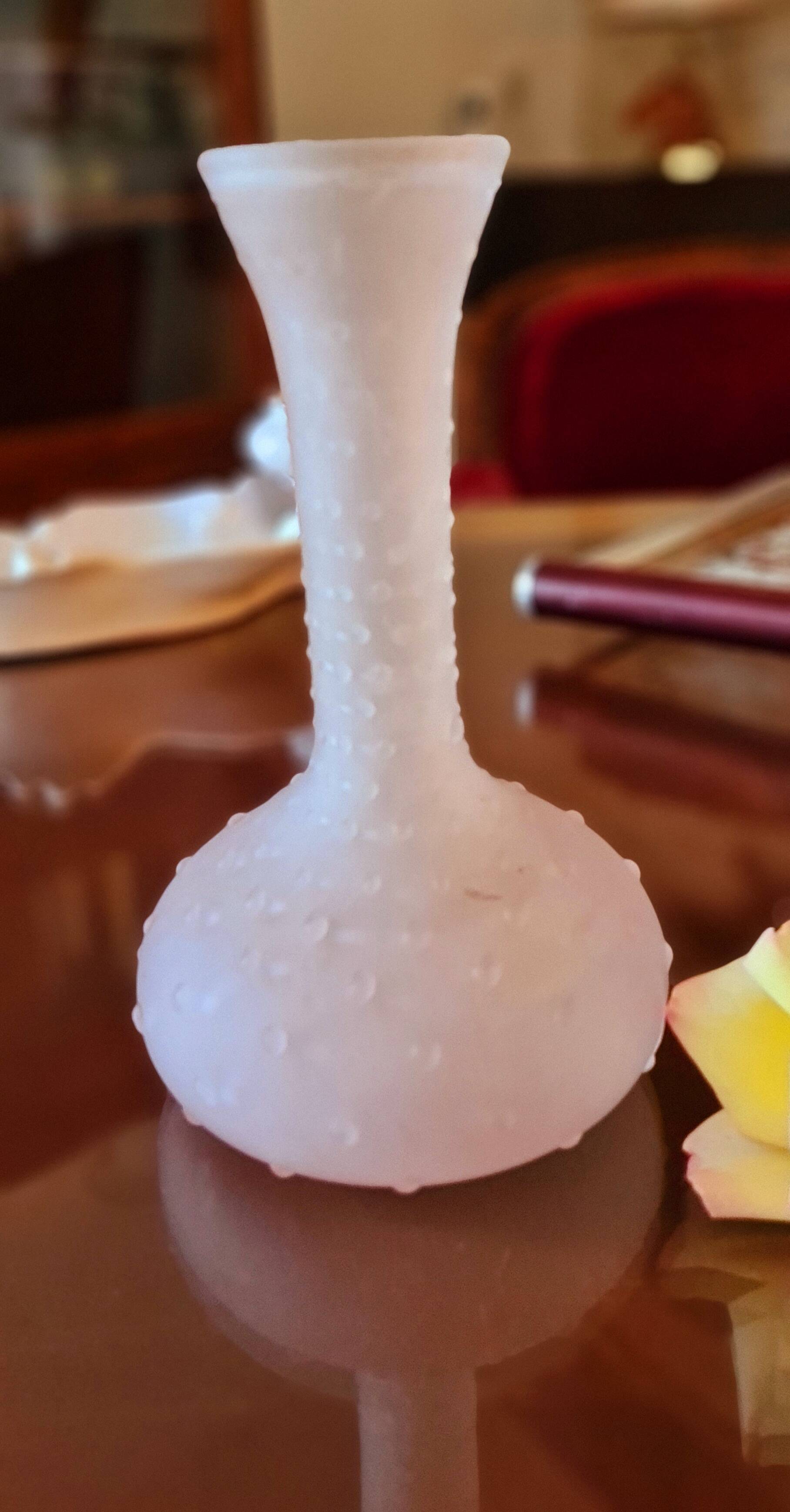 Small molded glass vase