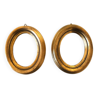 Pair of old oval golden wood frames