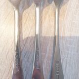 Set of 7 forks and 1 spoon in silver metal