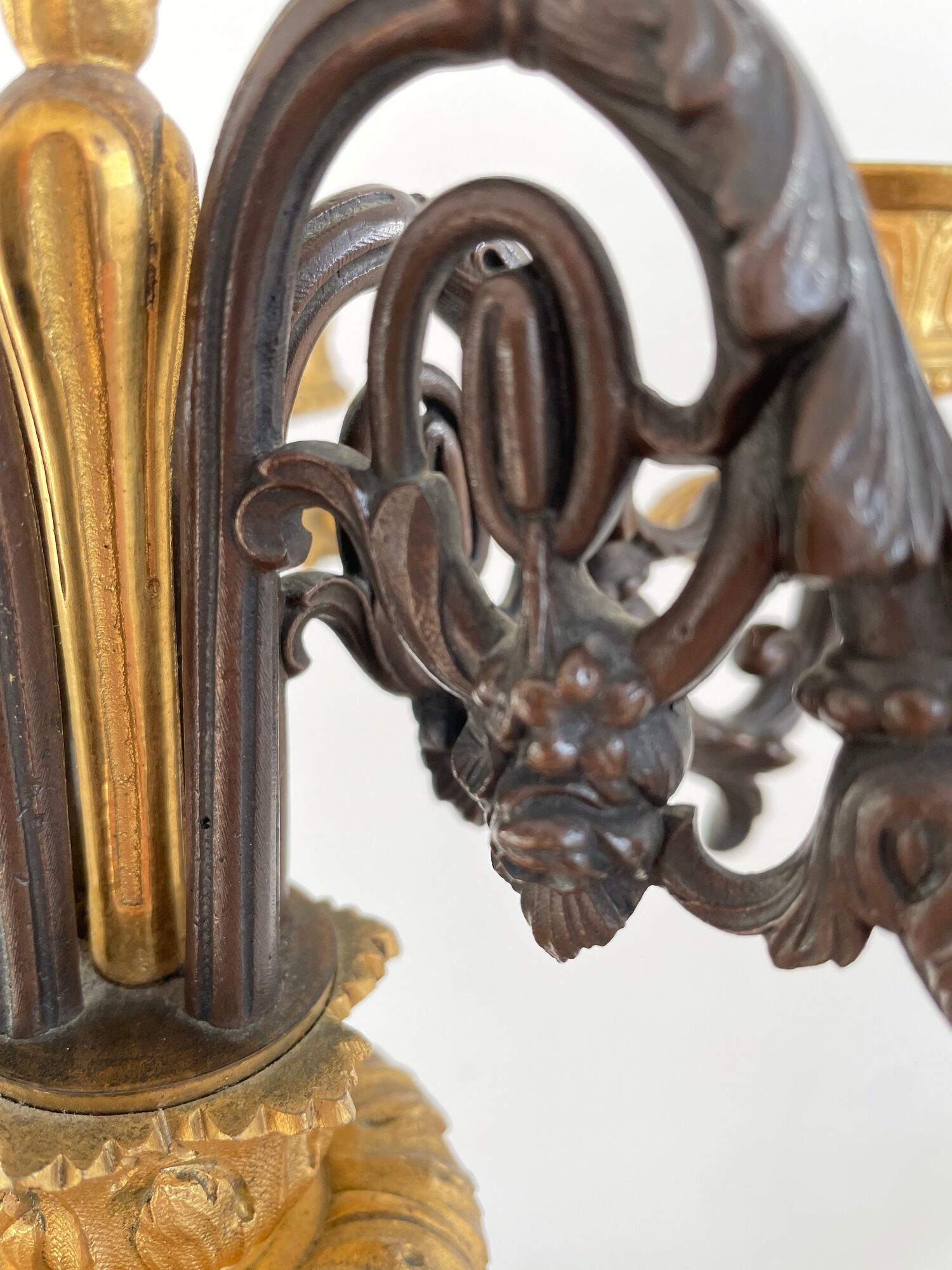 Candelabra with cherub in patinated bronze