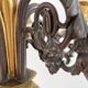 Candelabra with cherub in patinated bronze