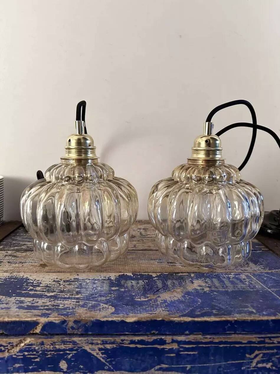 Pair of vintage amber glass pendant lights