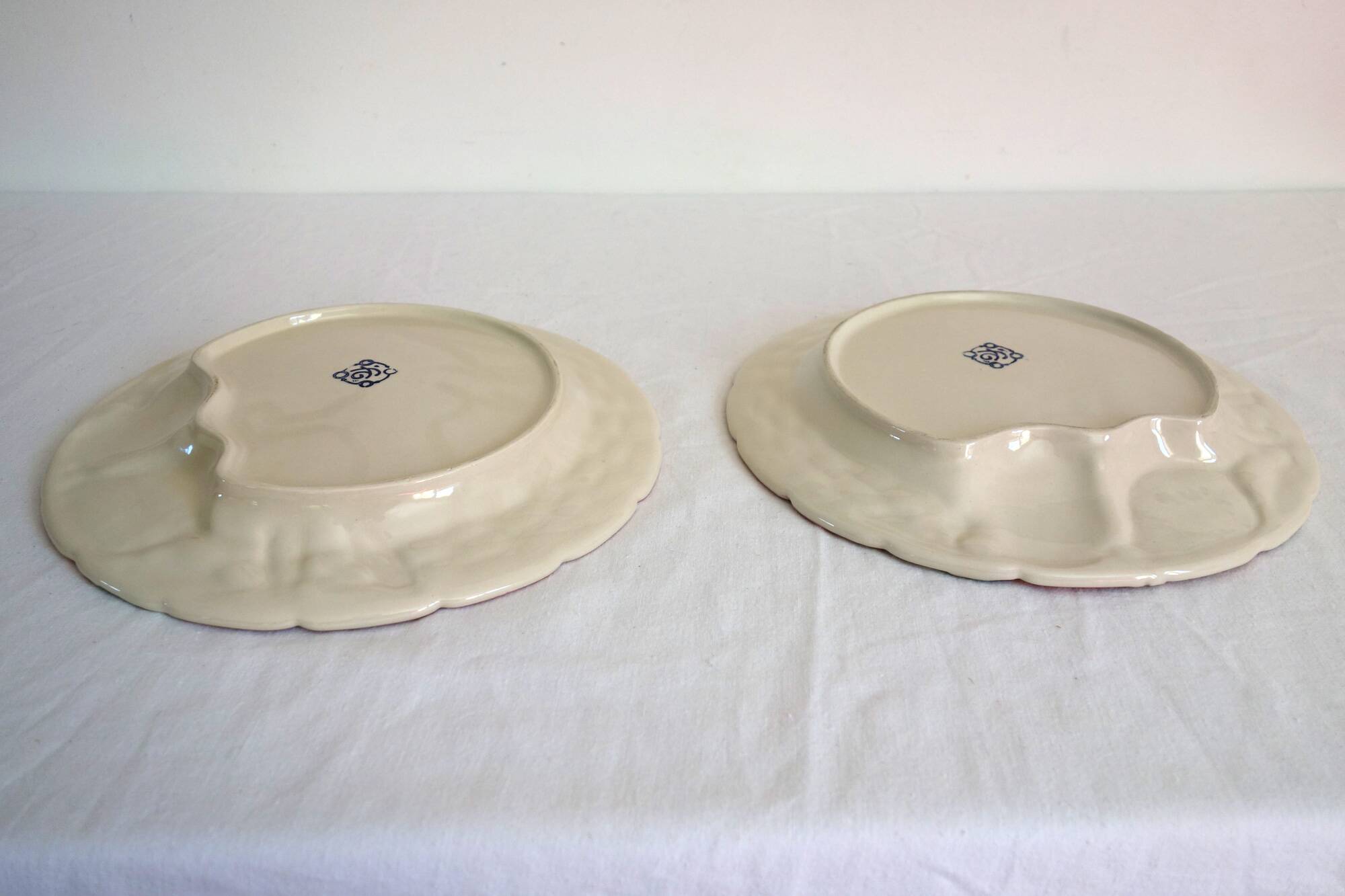 2 vintage pomegranate slip plates signed Francesco Guarino
