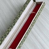 Blue chopsticks decorated with floral motifs.