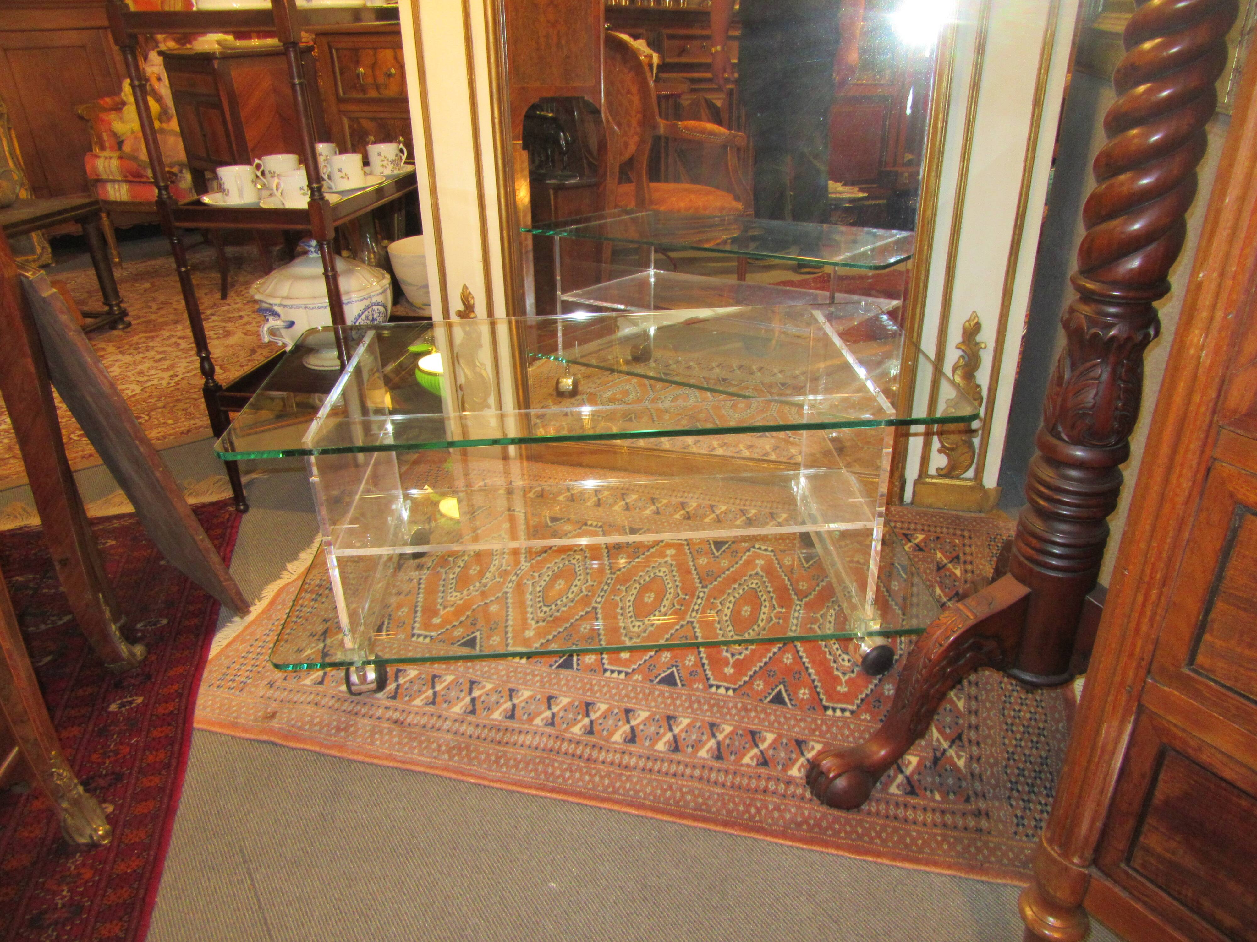 vintage glass coffee table with plexiglass legs