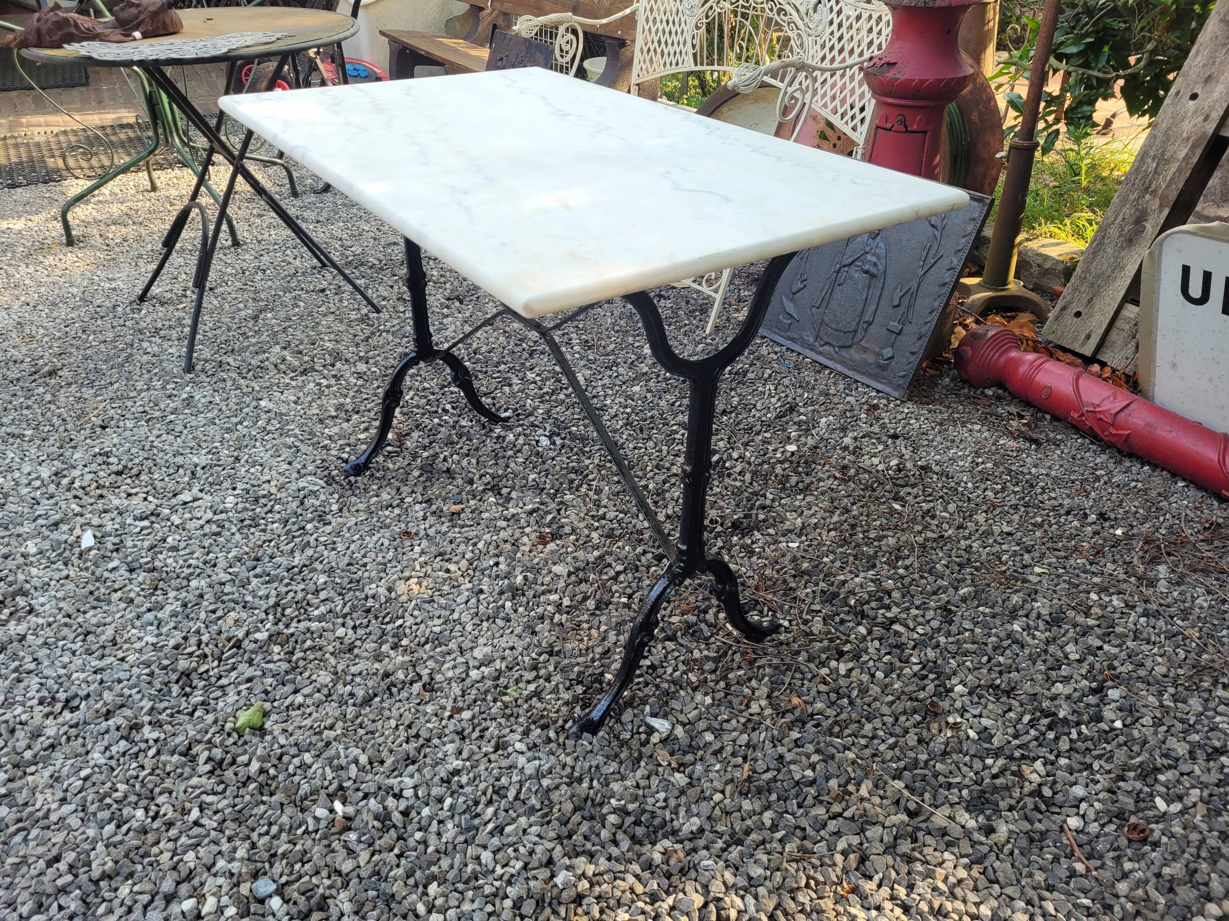 Bistro table top marble foot cast iron