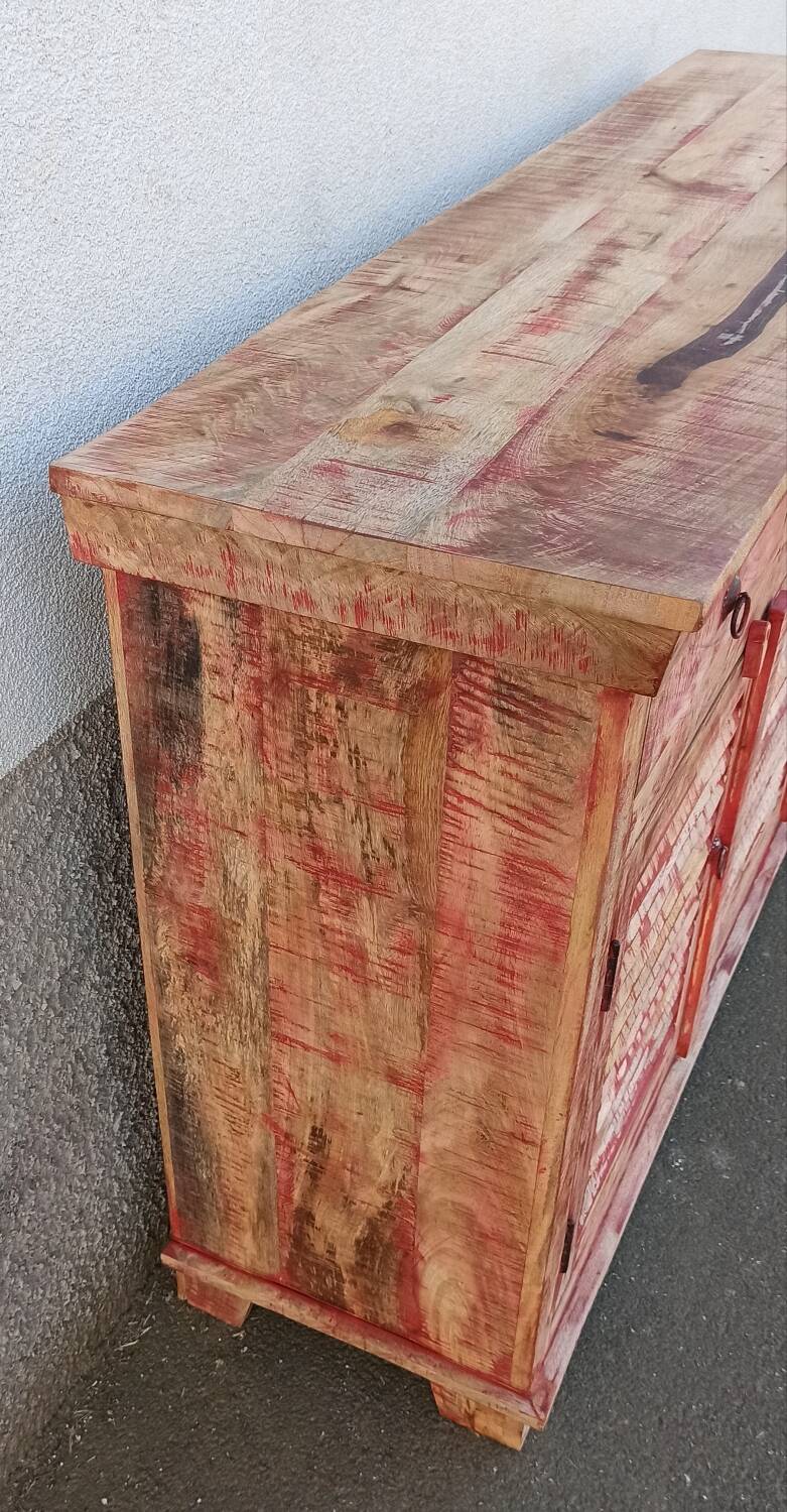 Wooden sideboard with red highlights
