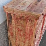 Wooden sideboard with red highlights