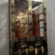 20th century China: Pretty bookcase in lacquer, hard stone and mother-of-pearl with three glazed sides