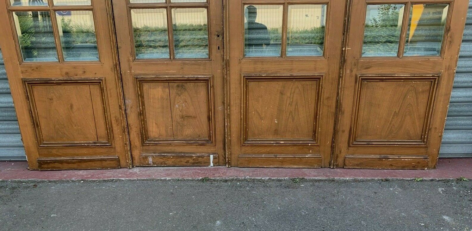 Suite of four separation doors in patinated wood Beveled tiles XX century