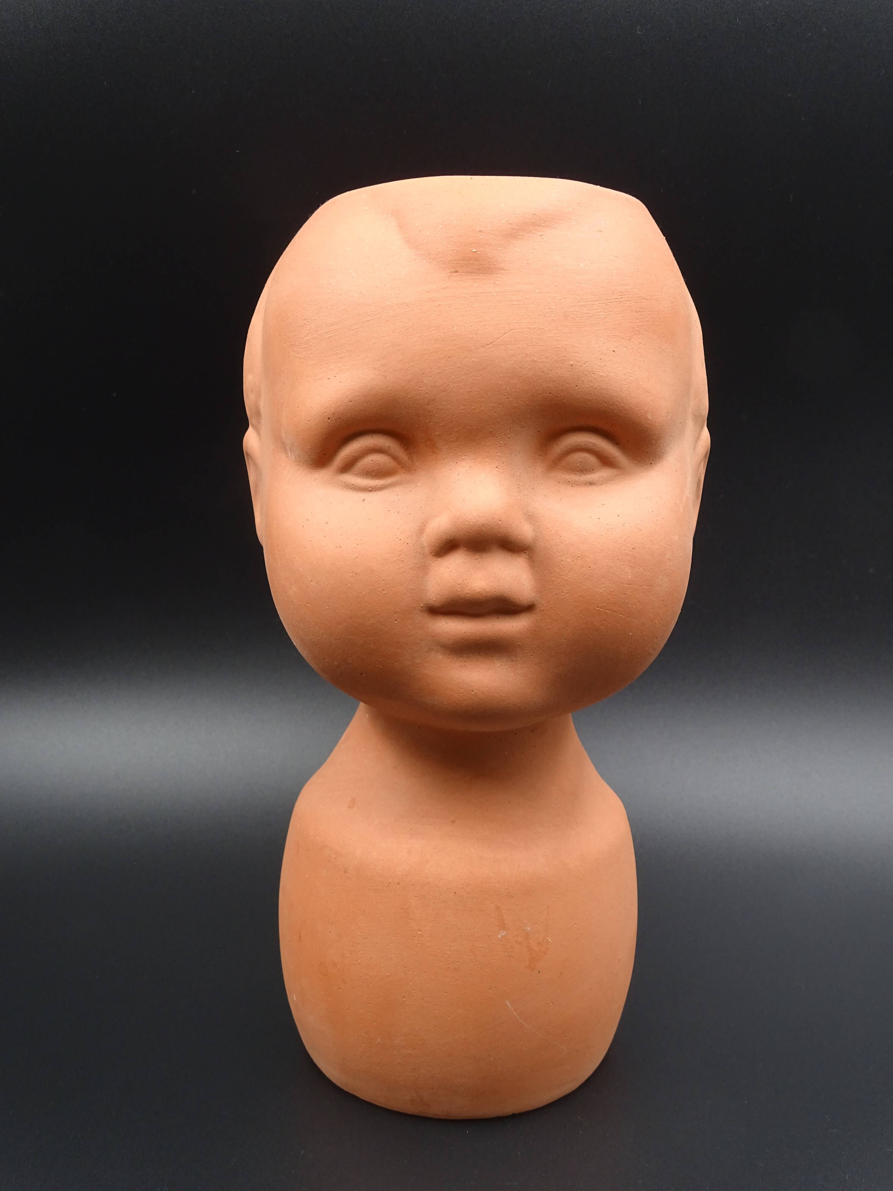 Vase in the shape of a baby's head - poupon