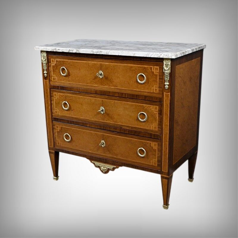 Small chest of drawers in amboyna and rosewood, Louis XVI style – 1940