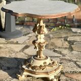 Carved and lacquered wooden side table.