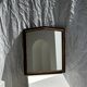 Small antique English rectangular mirror with pediment and oak frame