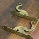 Antique wall hooks, dragon shape, in brass