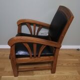 Colonial armchair in teak and black leather