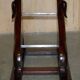 Pair of hardwood library steps with carved dogs, Regency style.