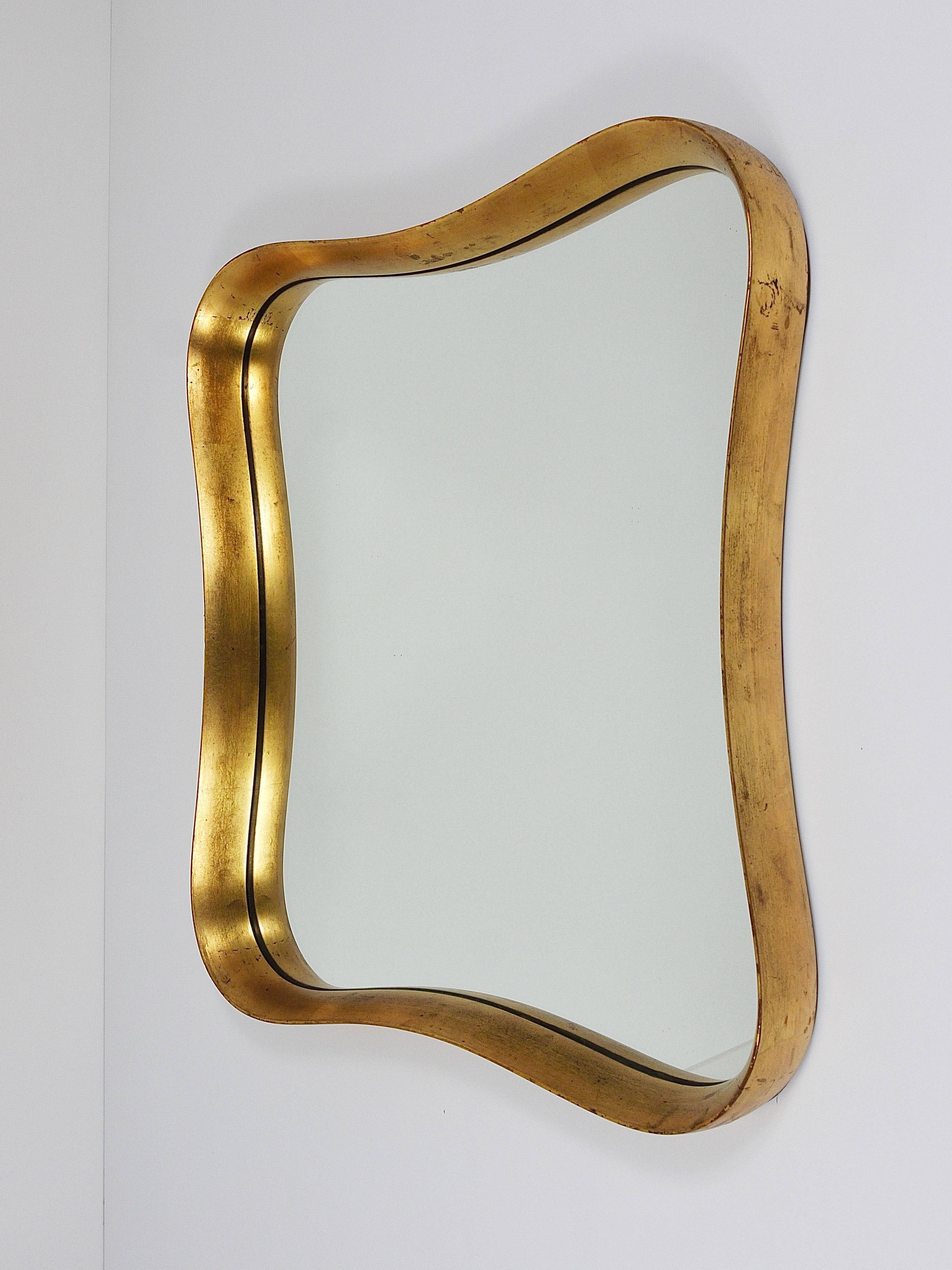 Golden wooden mirror in the style of Gio Ponti by Max Welz, Vienna, Austria, 1940s.