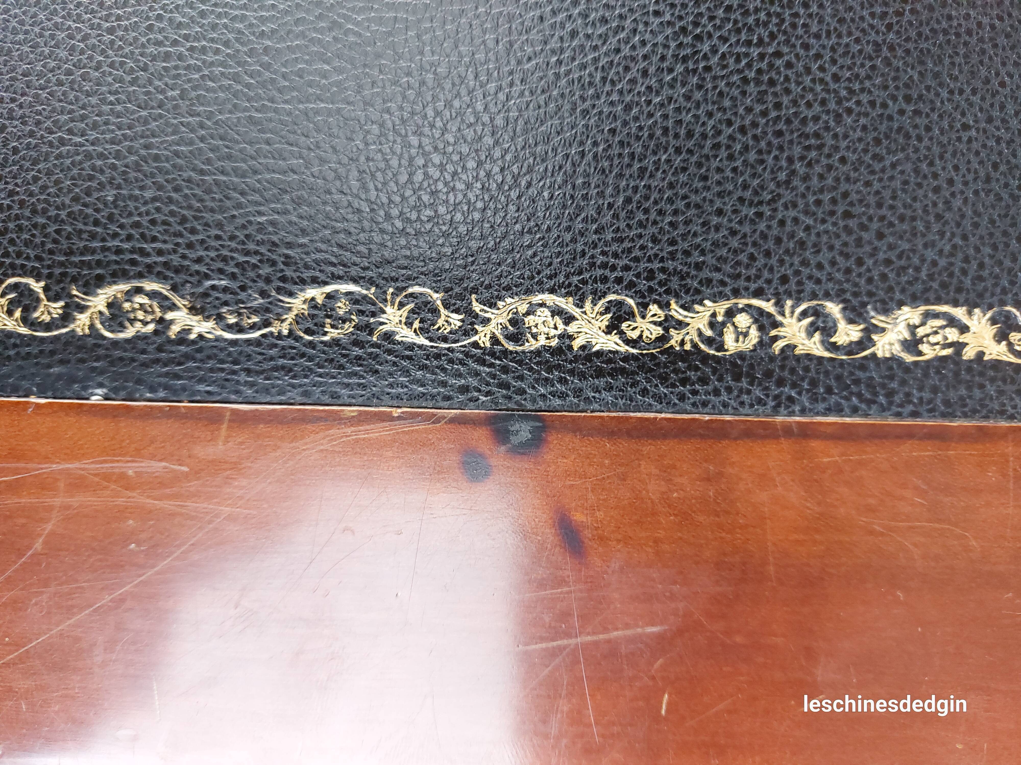 Black leather desk with extensions