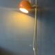 Mid-Century orange floor lamp with "eyeball" shade