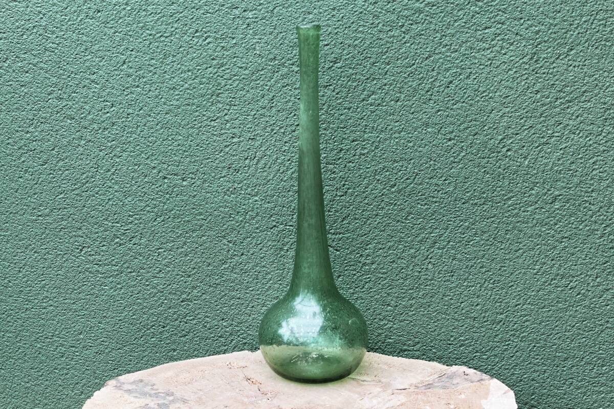 Single-flower vase in blown, bubbled glass, signed Biot