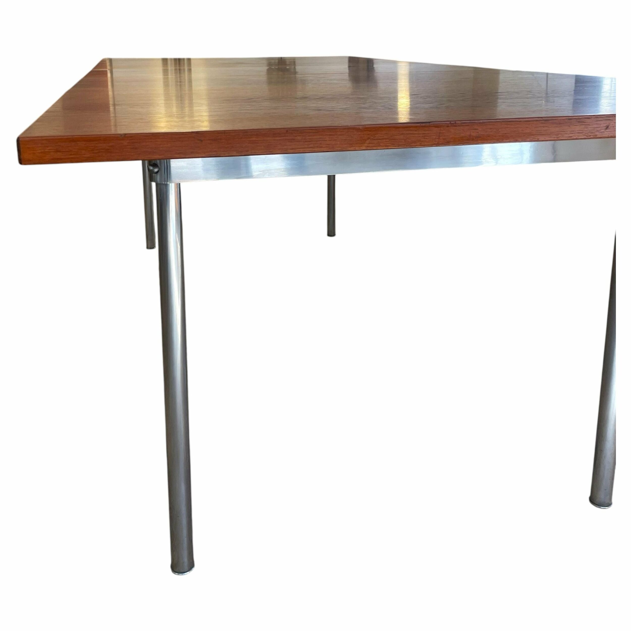Table model AT-318 in teak and steel by Hans J. Wegner.