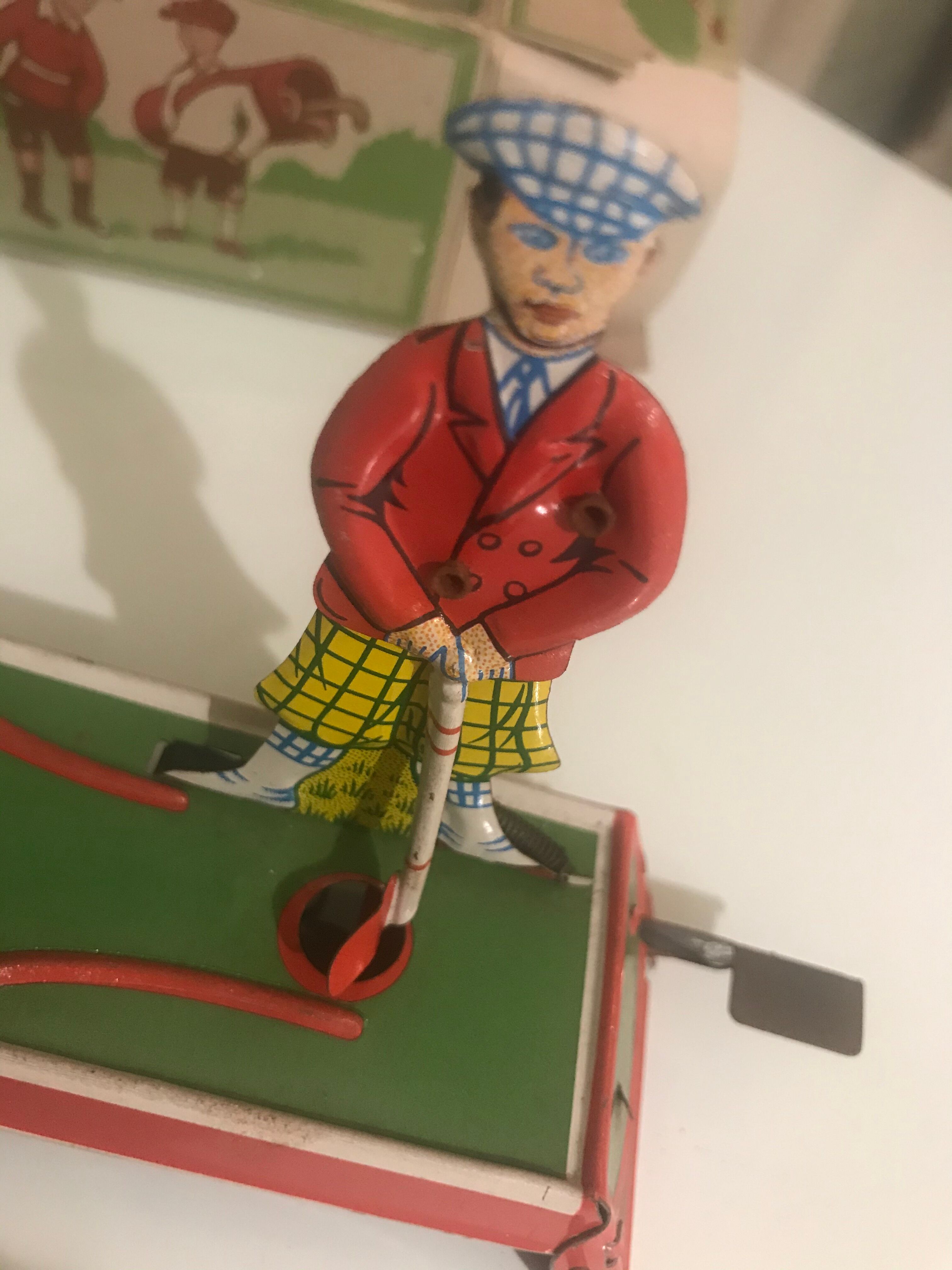 Ancient mechanical toy "Golfer"