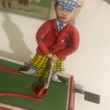 Ancient mechanical toy "Golfer"